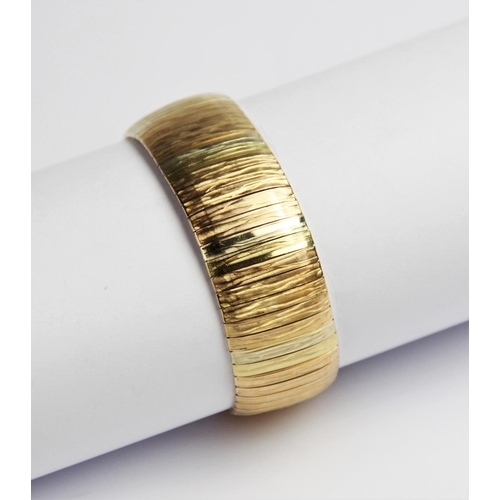 248 - An 18ct gold three colour bracelet, comprising alternating panels of yellow, white and rose gold wit... 