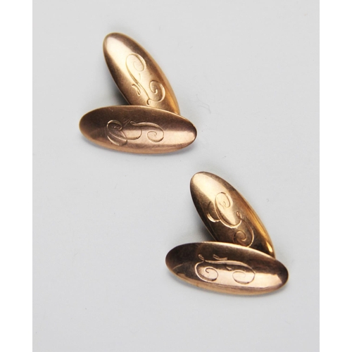 258 - A pair of 9ct gold cufflinks, each of of oval form with engraved initials 'F' and 'G', each panel 24... 