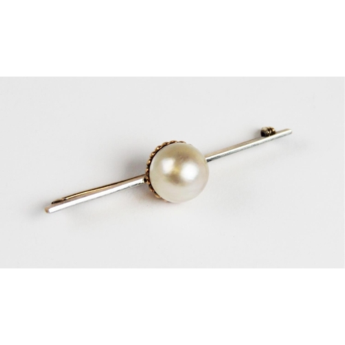 268 - An untested pearl set brooch, the central pearl (measuring approximately 12mm diameter) within a yel... 