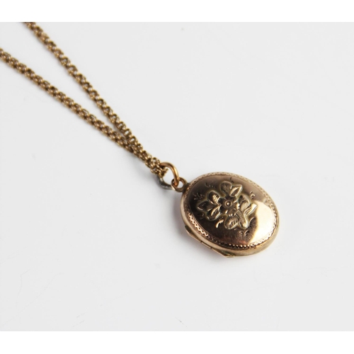 278 - An Edwardian 9ct gold locket pendant, marks for Chester 1901, of oval form with floral bouquet decor... 