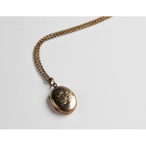 278 - An Edwardian 9ct gold locket pendant, marks for Chester 1901, of oval form with floral bouquet decor... 