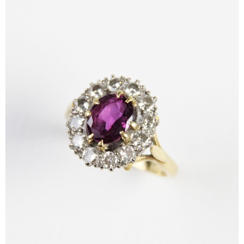 289 - A pink stone and diamond cluster ring, comprising a central untested oval mixed cut stone (probably ... 