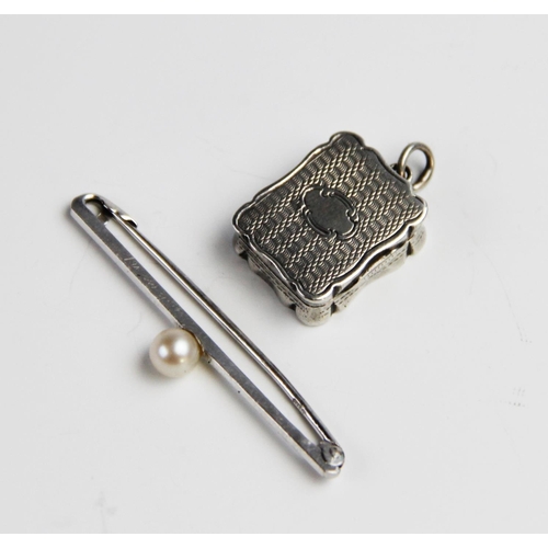 290 - A Victorian silver vinaigrette pendant by Alfred Taylor, Birmingham 1865, of rectangular form with s... 