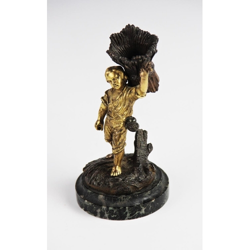 299 - A Grand Tour gilt bronze table vesta, 19th century, modelled as a young boy carrying a wheat sheaf, ... 