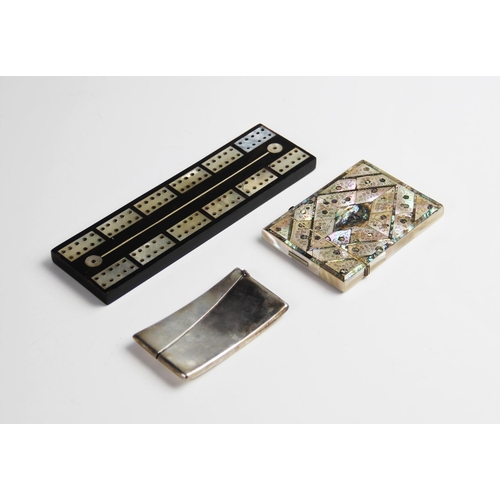 303 - A mother of pearl card case, of rectangular form inlaid with abalone shell and engraved floral decor... 