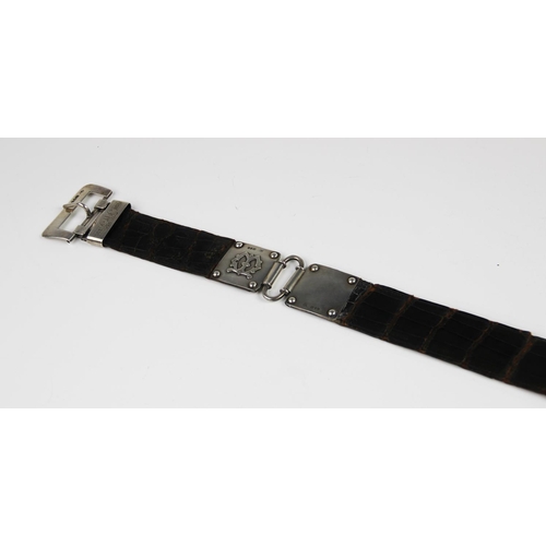 31 - A Victorian silver mounted belt, Charles Boynton II, London 1897, the silver belt loop engraved 'Fro... 