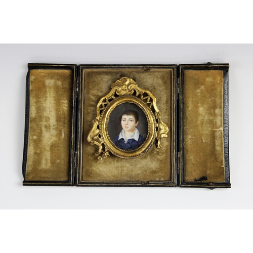 312 - A Victorian watercolour on ivory bust length portrait miniature of a young boy, late 19th century, t... 