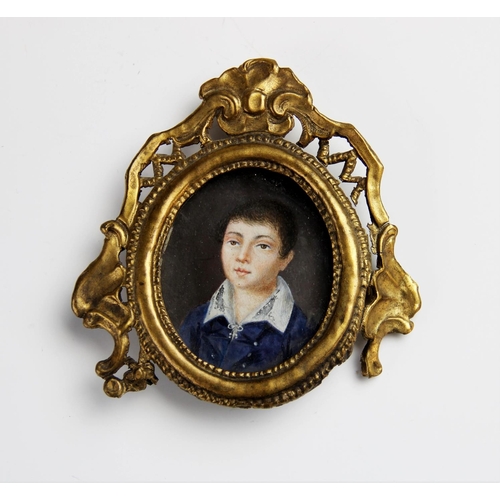 312 - A Victorian watercolour on ivory bust length portrait miniature of a young boy, late 19th century, t... 