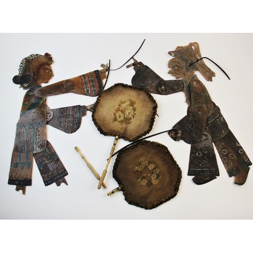 322 - Two Indonesian shadow puppets, late 19th/early 20th century, each of typical form hand made in toole... 