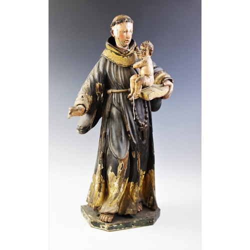 328 - An Italian carved painted wood and gesso figural carving of St. Anthony of Padua and Infant Christ, ... 