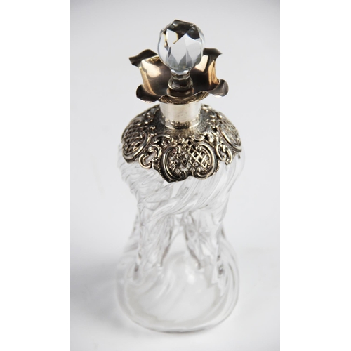 33 - A Victorian silver vase, Charles Stuart Harris, London 1890, the vase of trumpet form with wrythen b... 