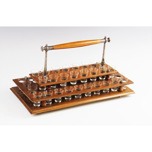 344 - A Methodist Church communion set, early 20th century, comprising forty small conical shot glasses se... 