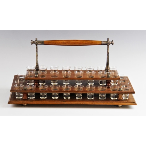 344 - A Methodist Church communion set, early 20th century, comprising forty small conical shot glasses se... 