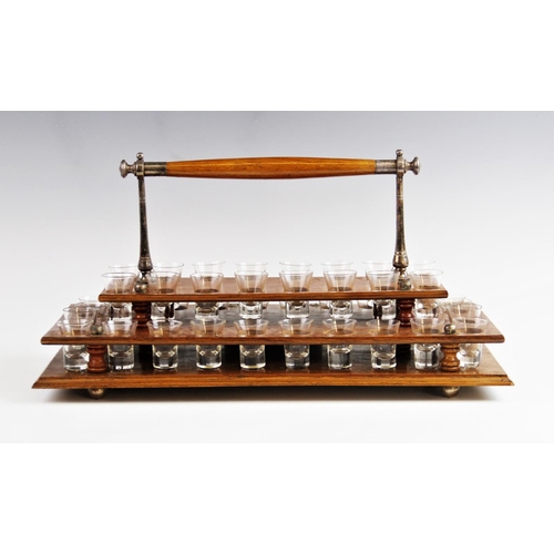 344 - A Methodist Church communion set, early 20th century, comprising forty small conical shot glasses se... 