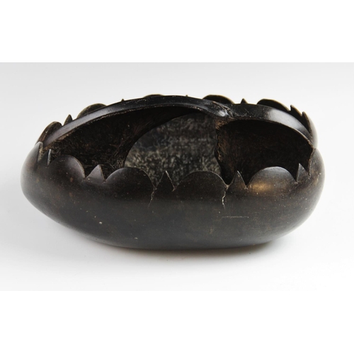 350 - A Coco-de-mer seed (Lodoicea maldivica), carved as a basket with shaped rim and integral handle fash... 