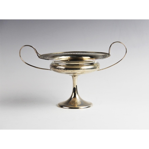 4 - An Edwardian silver twin-handled bon-bon dish by Williams (Birmingham) Ltd, Birmingham 1906, of circ... 