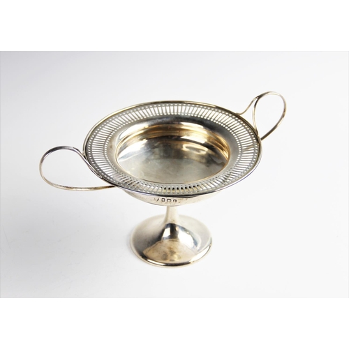 4 - An Edwardian silver twin-handled bon-bon dish by Williams (Birmingham) Ltd, Birmingham 1906, of circ... 