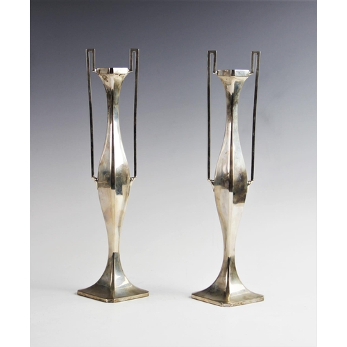 5 - A pair of Art Nouveau silver stem vases by James Deakin & Sons, Chester 1908, of plain polished face... 
