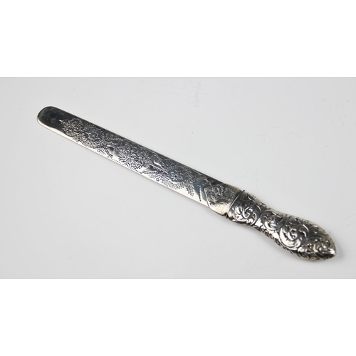 64 - Victorian silver page turner by George Unite & Sons, Birmingham 1887, the blade engraved with flower... 