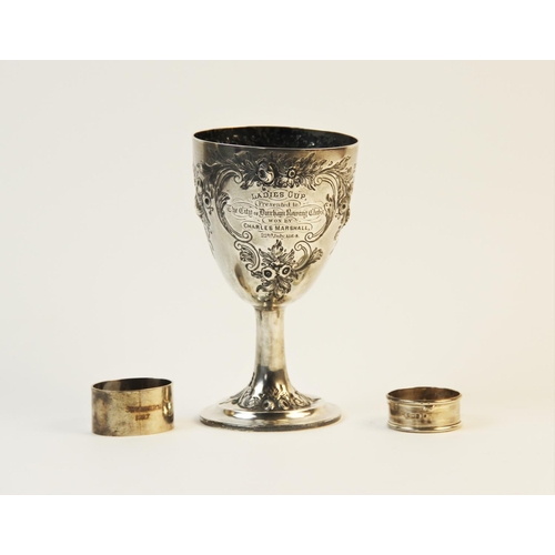 65 - A Victorian silver trophy cup by Thomas Smily, London 1860, of tapering form on stepped circular foo... 