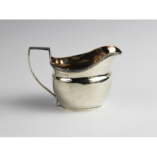 67 - A George III silver cream jug by Duncan Urquhart & Naphtali Hart, London 1806, of plain polished for... 