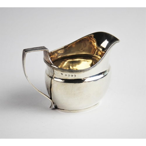 67 - A George III silver cream jug by Duncan Urquhart & Naphtali Hart, London 1806, of plain polished for... 