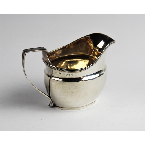 67 - A George III silver cream jug by Duncan Urquhart & Naphtali Hart, London 1806, of plain polished for... 