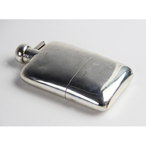 70 - A silver hip flask by Henry Matthews, Birmingham 1924, of rectangular plain polished form with hinge... 