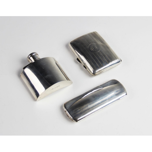 71 - A George VI silver hip flask by by Stokes & Ireland, Chester 1939, of curved rectangular form with h... 