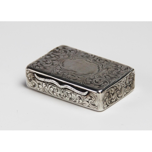 79 - A silver snuff box by Edward Smith, Birmingham 1851, of rectangular form engraved scrolling decorati... 