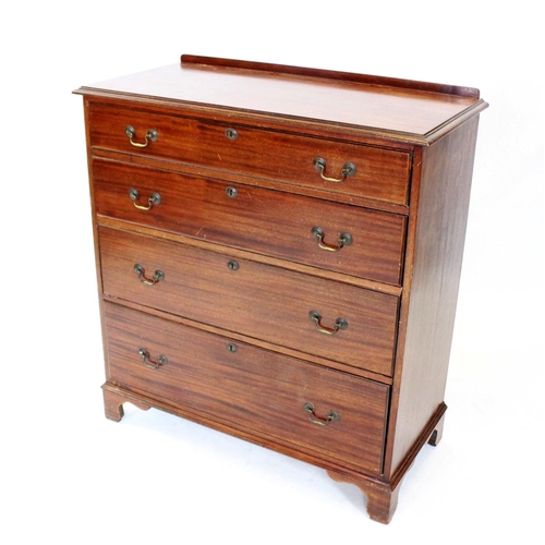 838 - An Edwardian mahogany chest of drawers, the rectangular moulded top above four graduated long drawer... 