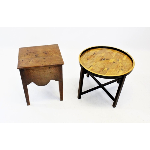 846 - An early 20th century folding table, the circular parquetry tray top with ebonised rim raised upon a... 