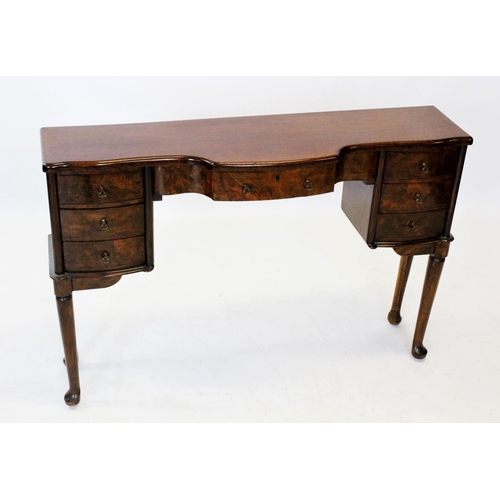 847 - A burr walnut side table, circa 1930, later reconstructed from a dressing table, with a single bow f... 