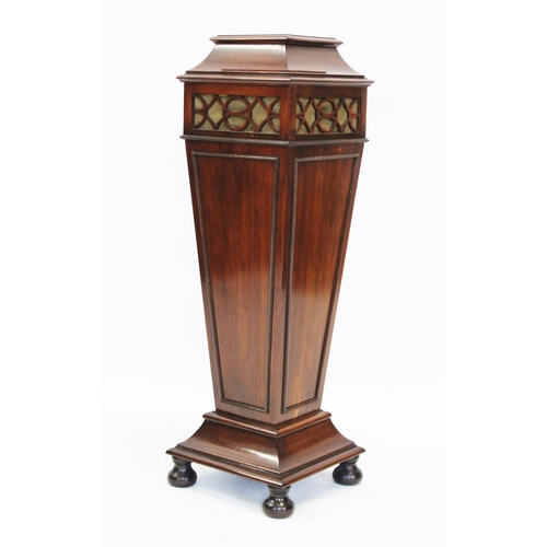 856 - An Edwardian mahogany lamp or urn pedestal, the pagoda shaped top above a fretwork frieze, and a tap... 