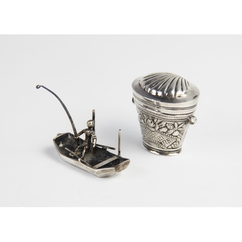 89 - A Dutch silver novelty miniature hat box, of tapering form with embossed floral decoration to body, ... 