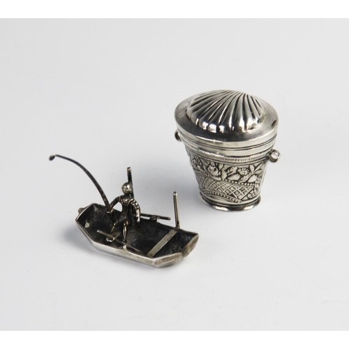 89 - A Dutch silver novelty miniature hat box, of tapering form with embossed floral decoration to body, ... 