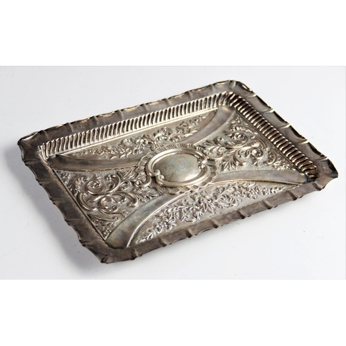 9 - A late Victorian silver tray by William Devenport, Birmingham 1900, of rectangular form with embosse... 
