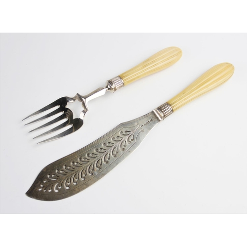 90 - A pair of Victorian silver bladed fish servers by Joseph Rodgers & Sons, Sheffield 1883-4, each with... 