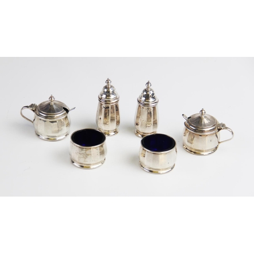 91 - A silver condiment set by Walker & Hall, Birmingham 1955, comprising two pepperettes, two open salts... 