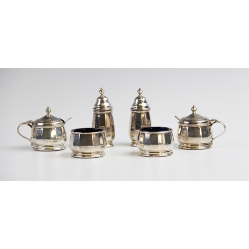 91 - A silver condiment set by Walker & Hall, Birmingham 1955, comprising two pepperettes, two open salts... 