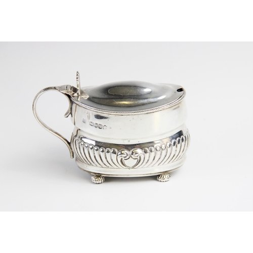 95 - A Victorian silver wet mustard by William Hutton & Sons, London 1887, of oval form with half reeded ... 