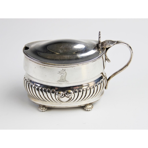 95 - A Victorian silver wet mustard by William Hutton & Sons, London 1887, of oval form with half reeded ... 