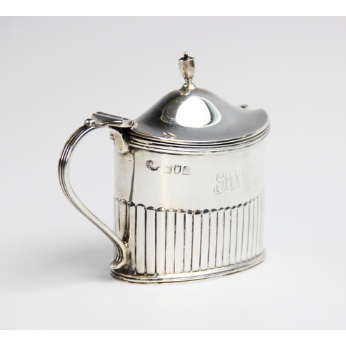 96 - An Edwardian silver wet mustard by Goldsmiths & Silversmiths Co, London 1903, of oval form with half... 