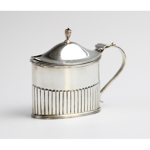 96 - An Edwardian silver wet mustard by Goldsmiths & Silversmiths Co, London 1903, of oval form with half... 