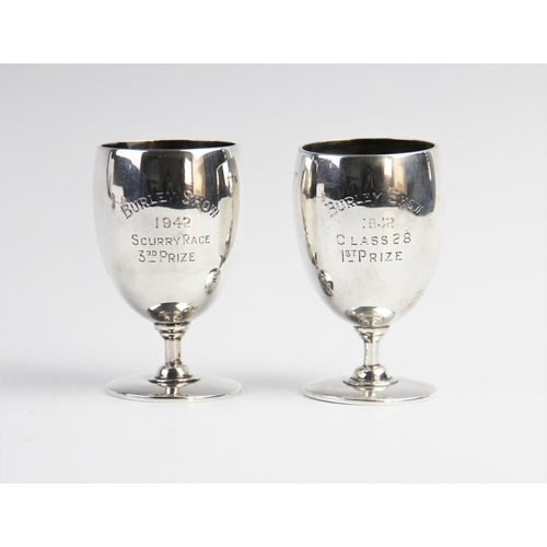 99 - A pair of Edwardian silver trophy cups by Goldsmiths & Silversmiths Co, London 1907, one engraved ‘B... 