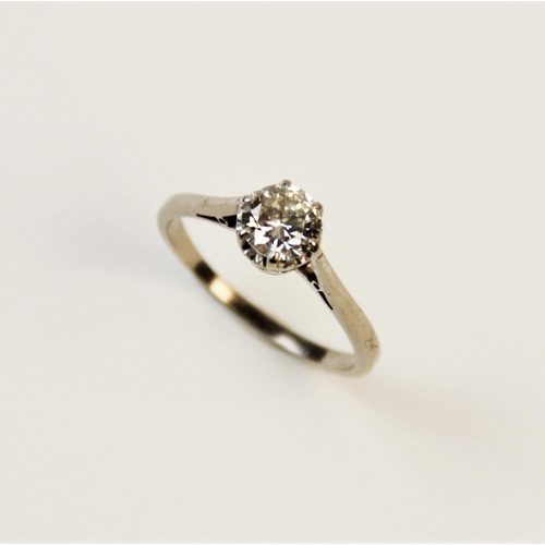 179 - A diamond solitaire ring, the central round brilliant cut diamond weighing approx. 0.62 carats, asse... 