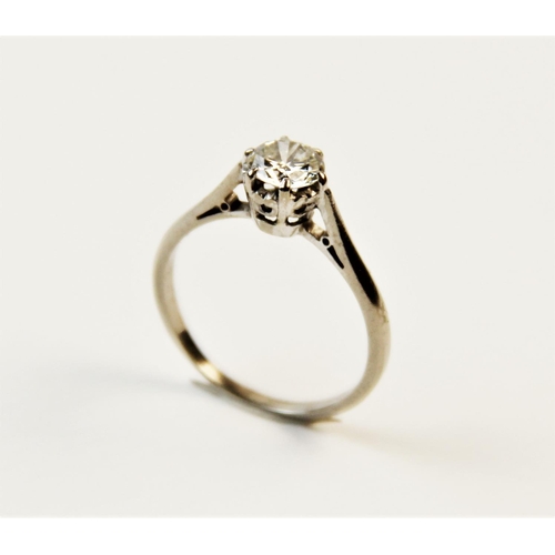 179 - A diamond solitaire ring, the central round brilliant cut diamond weighing approx. 0.62 carats, asse... 