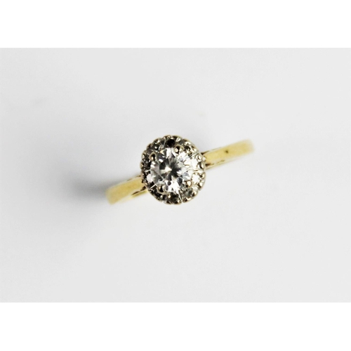 263 - A zircon and diamond 18ct gold cluster ring, comprising a central round brilliant cut white zircon m... 