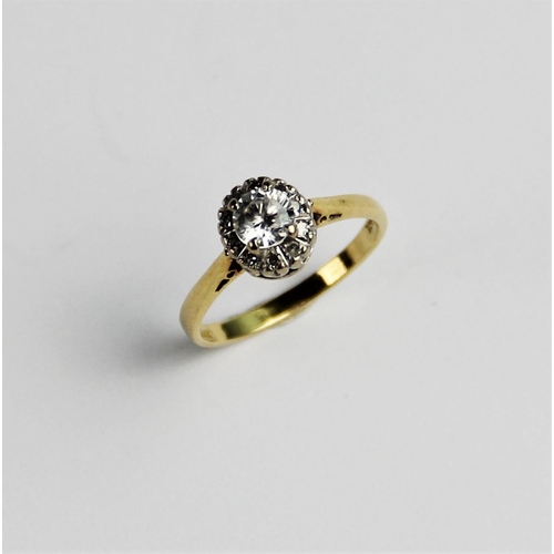 263 - A zircon and diamond 18ct gold cluster ring, comprising a central round brilliant cut white zircon m... 