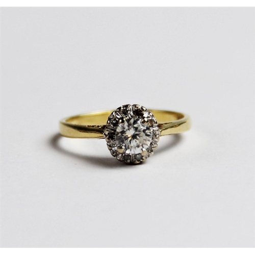 263 - A zircon and diamond 18ct gold cluster ring, comprising a central round brilliant cut white zircon m... 